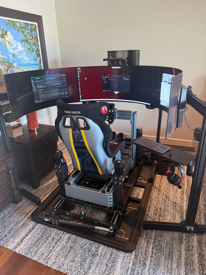 6DOF motion racing simulator at its original home location before relocation to a private auto garage.